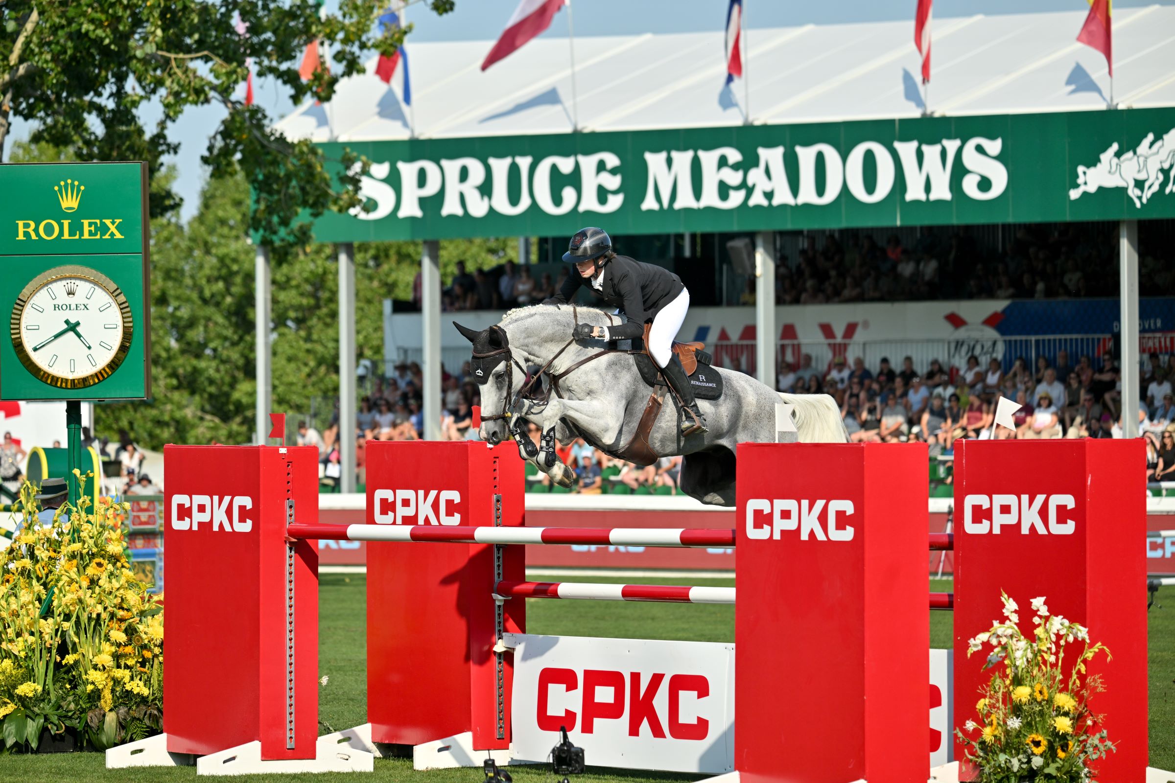 Horse jumping at Spruce Meadows